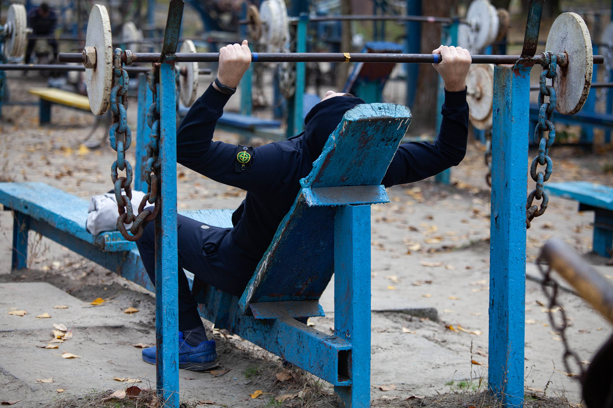 Guy lifting weights in Kachalka, Kyiv, Ukraine Guy lifting weights in Kachalka, Kyiv, Ukraine