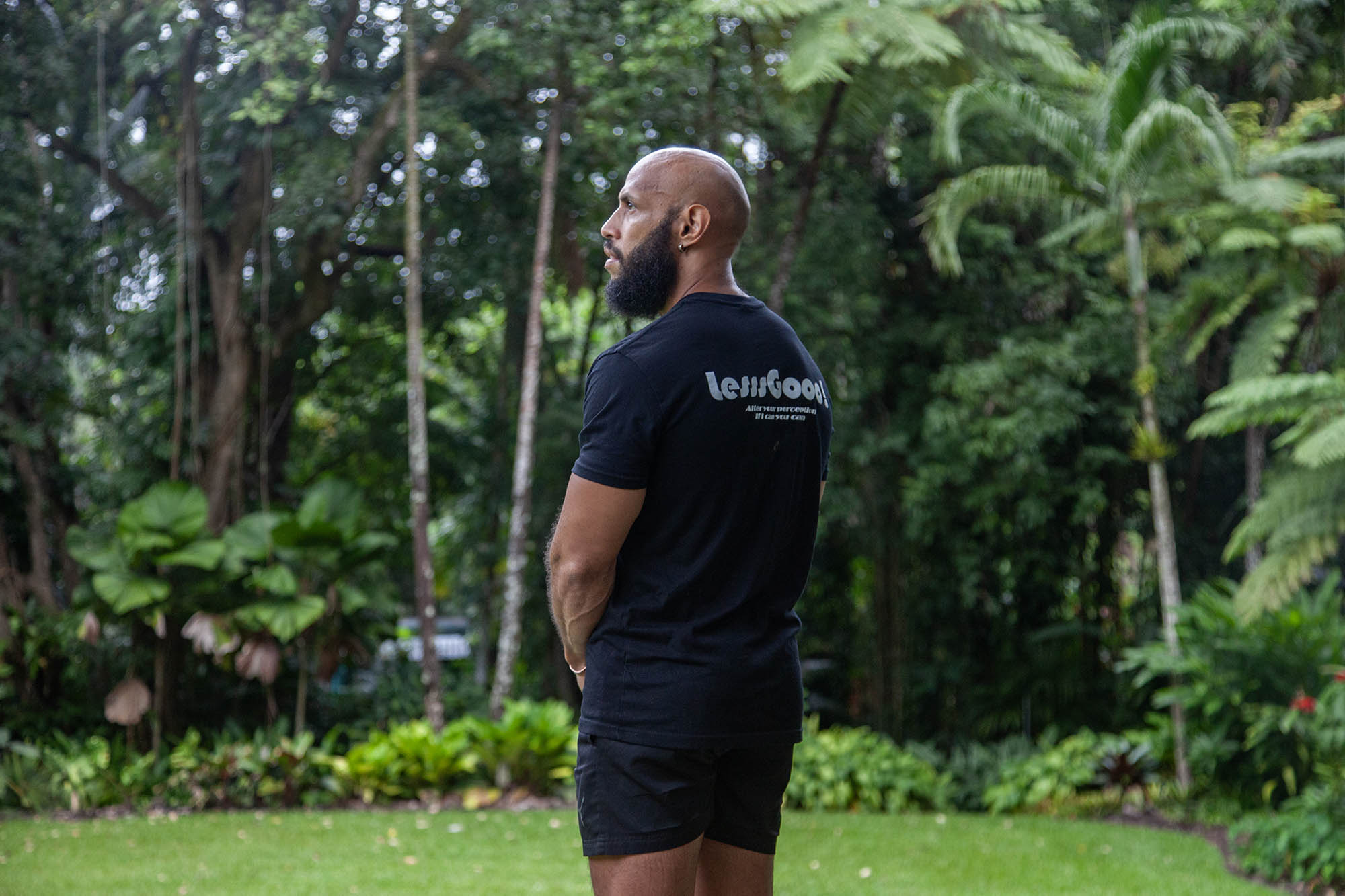 Mengui looking out across the gardens, Cairns, Australia