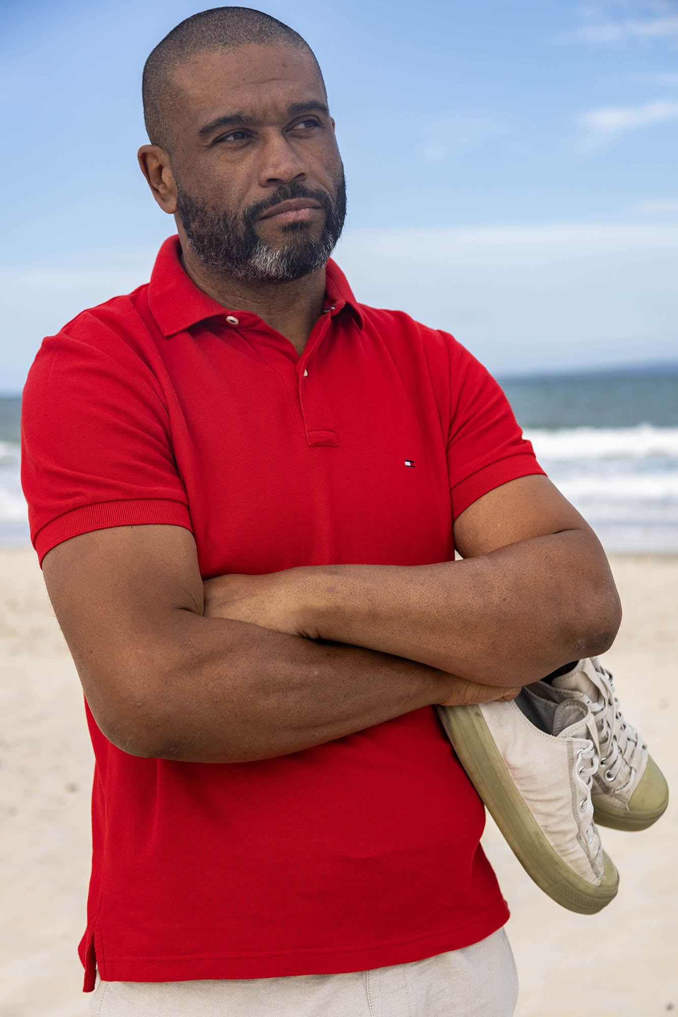 Kleber with shoes on beach, Bribie Island, Australia